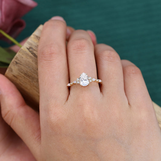 1CT Pear Shaped Moissanite Engagement Ring with Opal & Moissanite Accents
