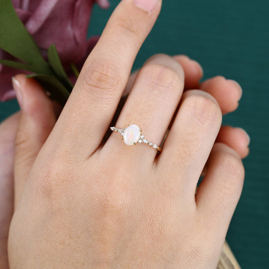 Four-Claw Prong Oval Cut Opal Engagement Ring with Moissanite Cluster Accents