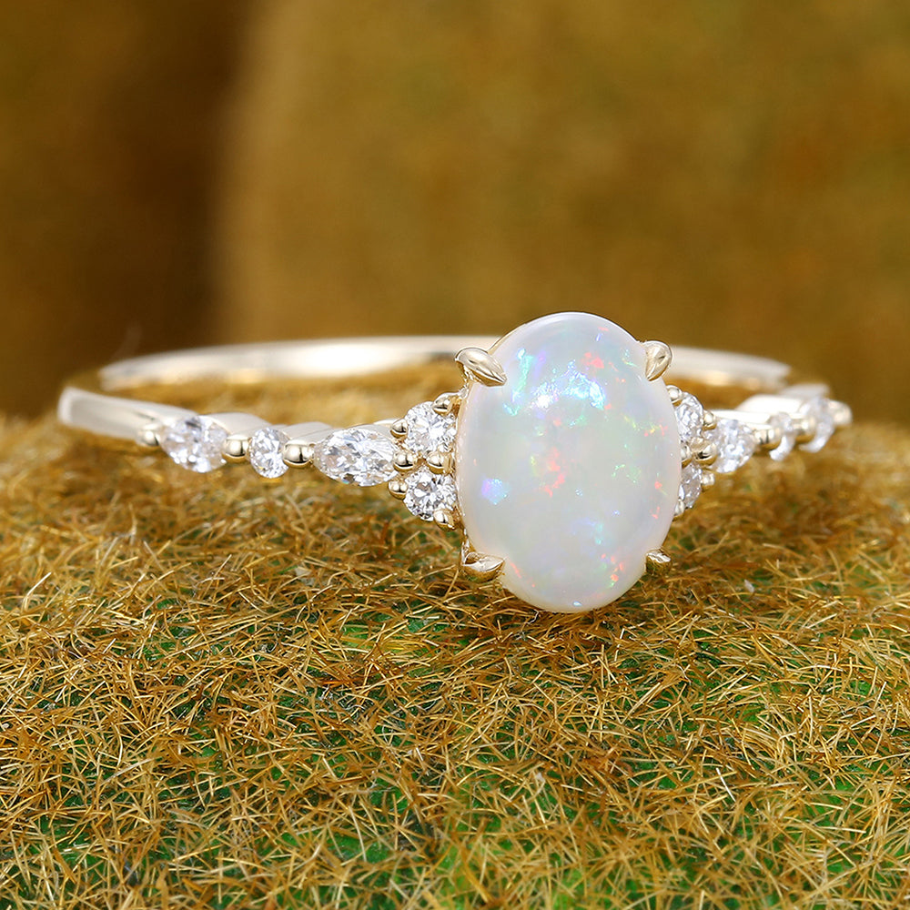 Four-Claw Prong Oval Cut Opal Engagement Ring with Moissanite Cluster Accents