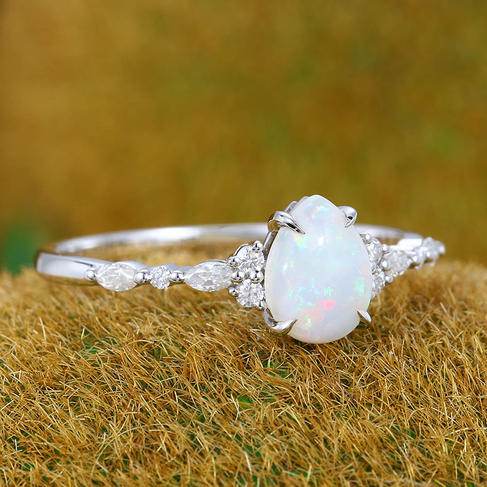 Four-Claw Prong Pear Shaped Opal Engagement Ring with Moissanite Cluster Accents