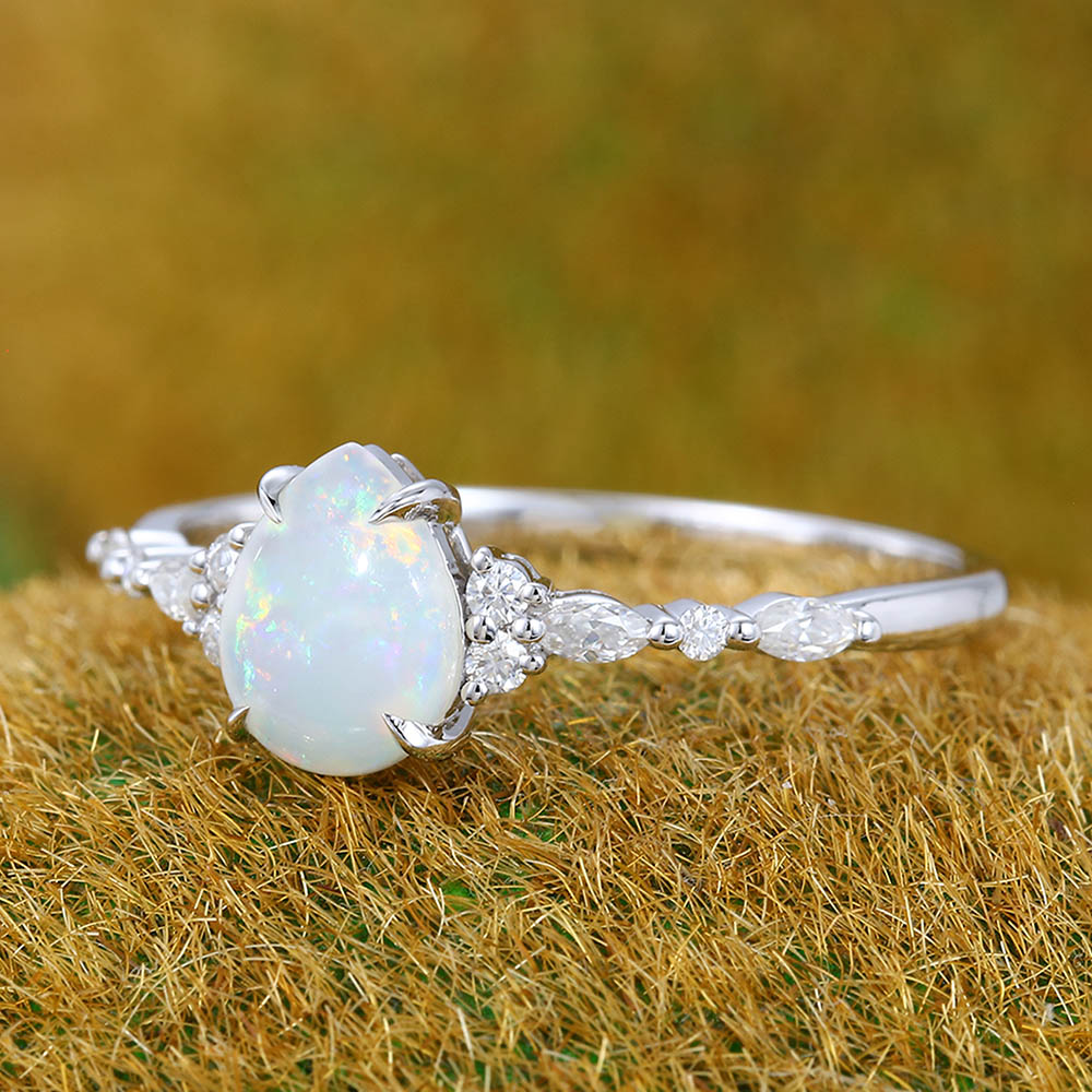 Four-Claw Prong Pear Shaped Opal Engagement Ring with Moissanite Cluster Accents