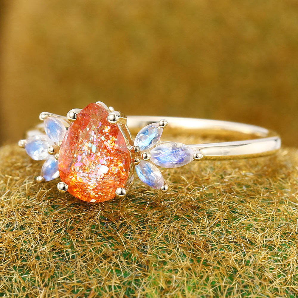 Pear Cut Sunstone Engagement Ring with Moonstone Cluster
