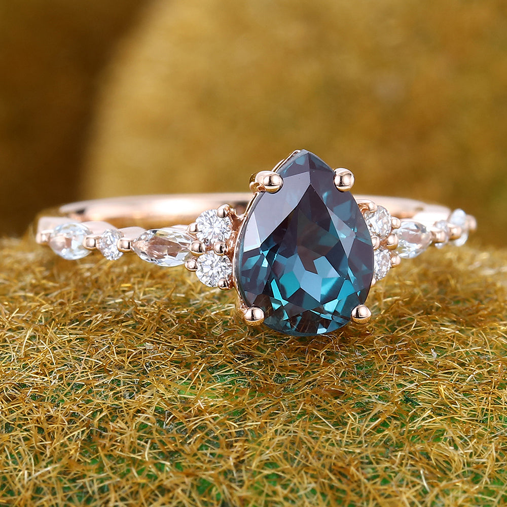 Pear Shape Alexandrite Engagement Ring with Moissanite Cluster Accents