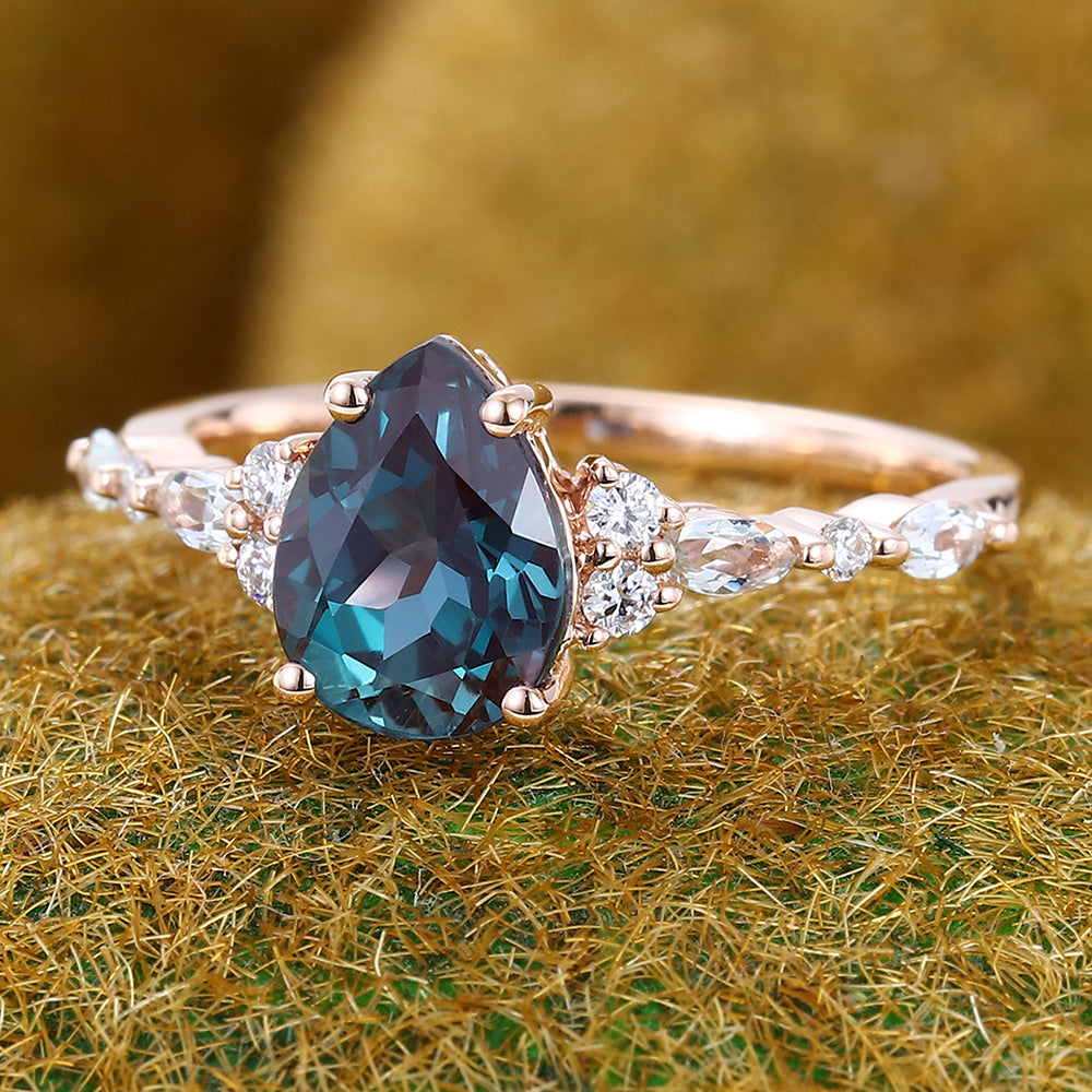 Pear Shape Alexandrite Engagement Ring with Moissanite Cluster Accents