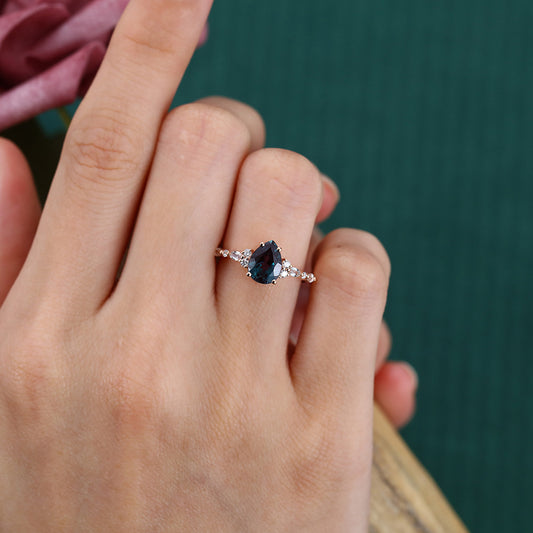 Pear Shape Alexandrite Engagement Ring with Moissanite Cluster Accents