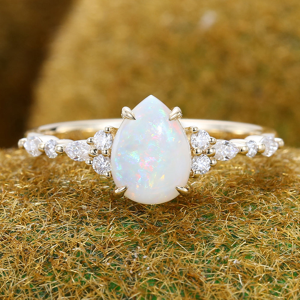 Four-Claw Prong Pear Shaped Opal Engagement Ring with Moissanite Cluster Accents