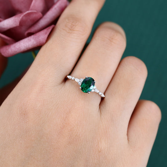 Vintage Oval Cut Emerald Engagement Ring with Moissanite Accents