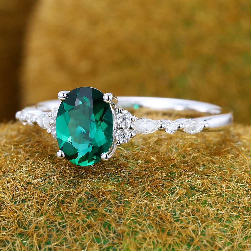 Vintage Oval Cut Emerald Engagement Ring with Moissanite Accents