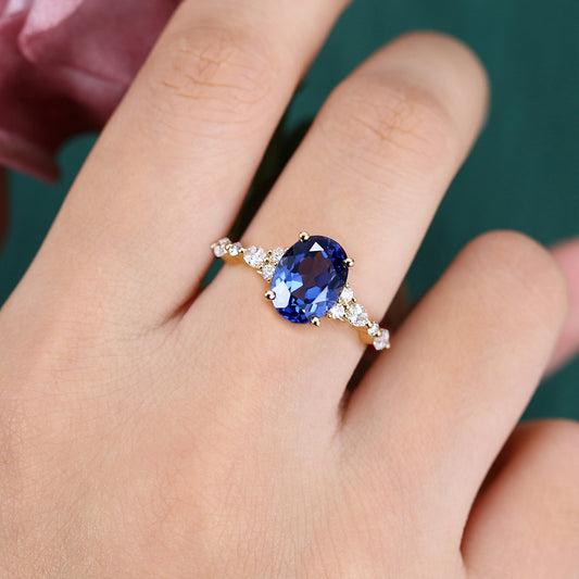 Vintage Oval Cut Cornflower Sapphire Engagement Ring with Cluster Accents