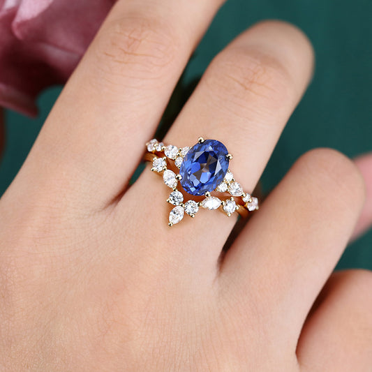 Vintage Oval Cut Cornflower Sapphire Engagement Ring Set with Antique Marquise Diamond Accents