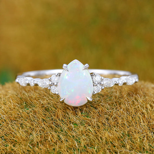 Four-Claw Prong Pear Shaped Opal Engagement Ring with Moissanite Cluster Accents