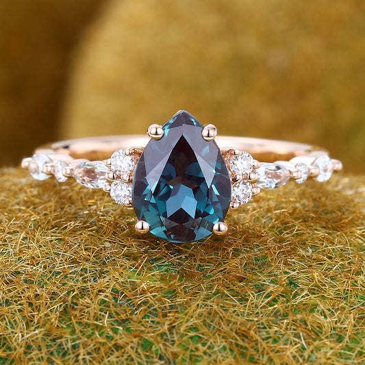 Pear Shape Alexandrite Engagement Ring with Moissanite Cluster Accents